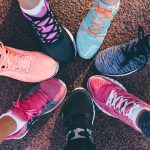 Image of Feet, Sneakers, Joined Together in a Circle