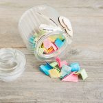 Image Class Jar Containing Colorful Folded Paper